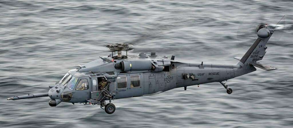 A Pave Hawk crew scoots at low level over the ocean towards RAF Lossiemouth after practicing and refining tactics on Tain Range during the Joint Warrior 16-1 exercise.