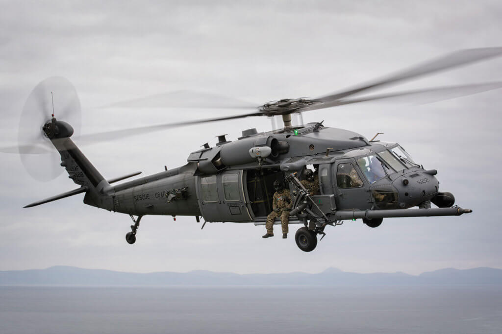 A Pave Hawk flies over the rugged landscape of Scotland in typically gloomy weather during the first Joint Warrior exercise of 2016, which saw the squadron basing out of RAF Lossiemouth and working extensively on Tain Range.