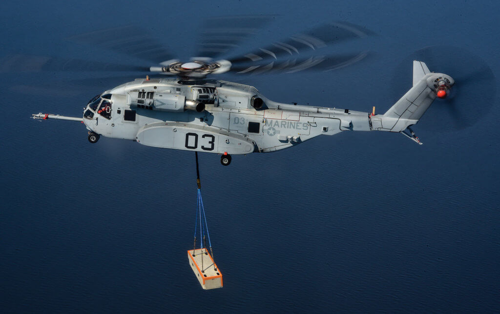 The CH-53K's center hook is rated for 36,000 lbs. (16,329 kg), while the fore and aft hooks are rated for 25,200 lbs. (11,400 kg).