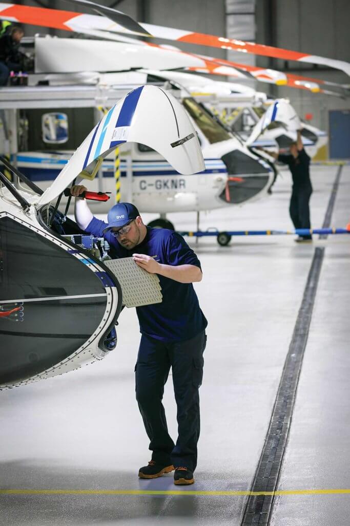 A Cougar maintenance technician performs routine system checks on a S-92 after the aircraft has completed a busy day of offshore flying. Heath Moffatt Photo