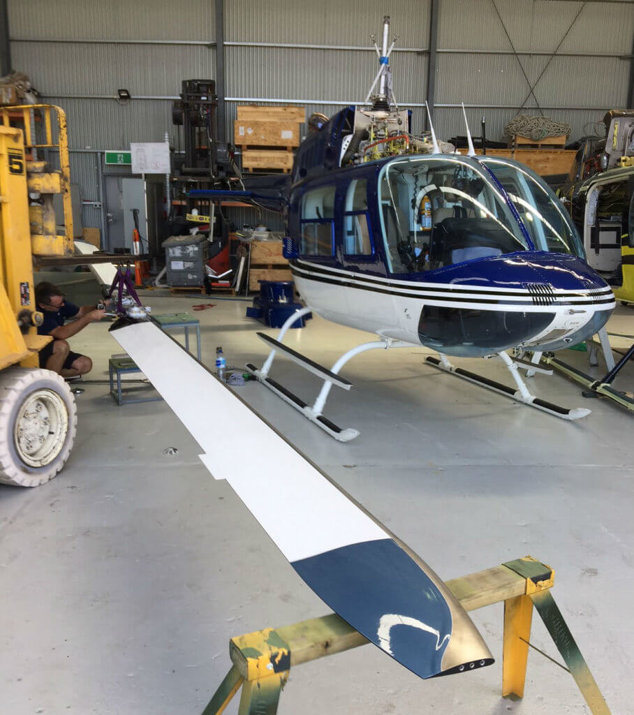 Certified by the Federal Aviation Administration in February 2016, the VHA 206B Jet Ranger main rotor blade features carbon fiber skin and spars, an efficient NASA-designed laminar-flow airfoil, tapered tip, and a combination of stainless steel and nickel abrasion strips that cover the entire length of the blade for erosion and lightning strike protection. Heliwest Photo