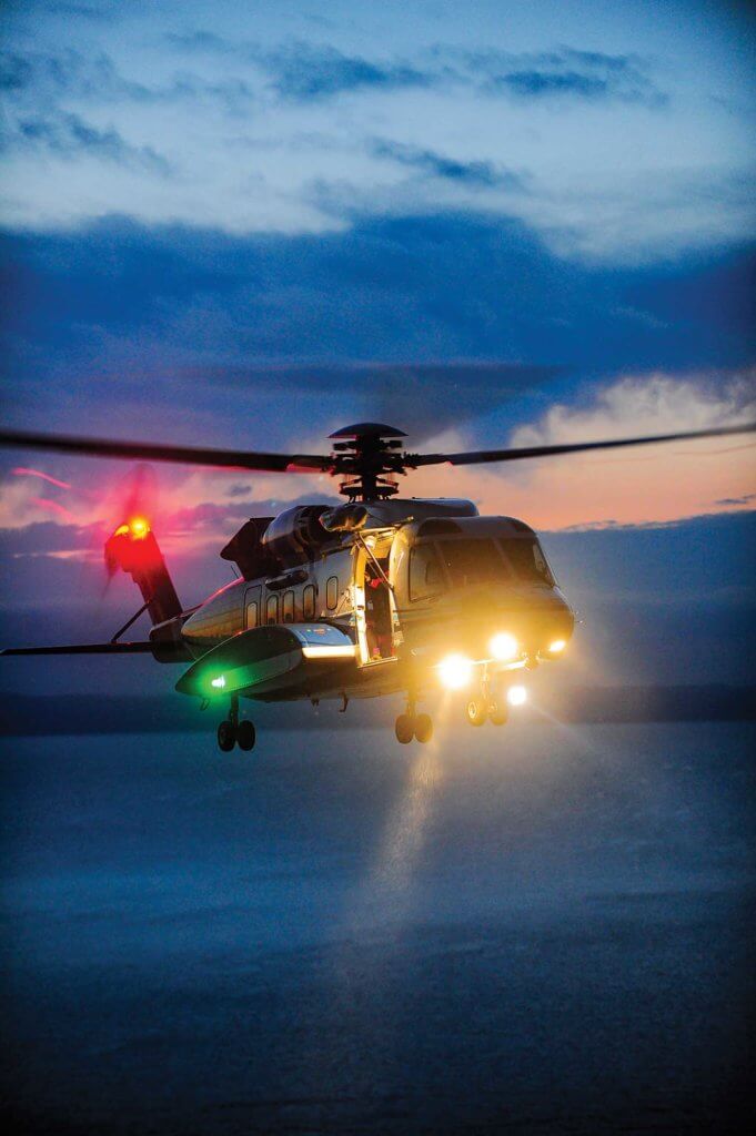A Cougar SAR S-92 completes a training operation under darkening skies. While the offshore sector may be going through difficult times now, Cougar believes brighter days are ahead. Mike Reyno Photo