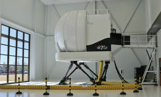 The Frasca Bell 407GX full flight simulator (FFS) stands at the ready in the new simulator wing of the Bell Helicopter Training Academy.