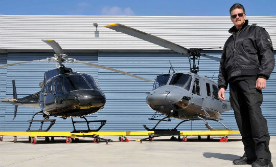 Studio Wings’ Steve Stafford with the company’s Eagle Single and AS350 B3.