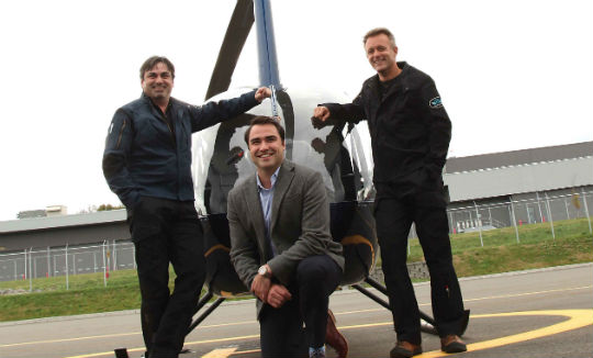 Geoffroy Tremblay (center), general manager of the Capitale Hélicoptère flight school, said it was looking to develop the international market — particularly in China. Jean Levasseur Photo
