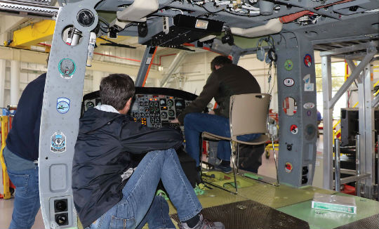 Mechanics receive electrical systems training on a Bell 412. Guy R. Maher Photo