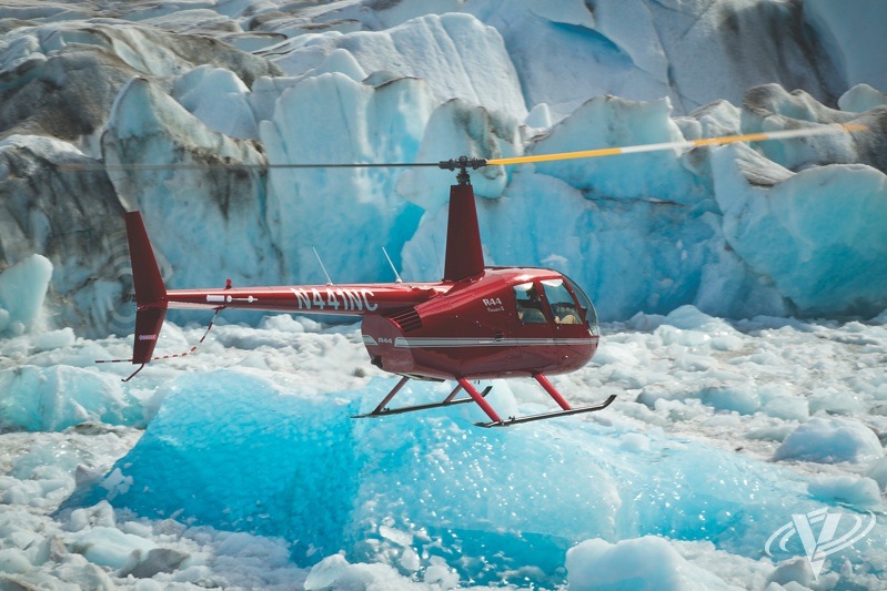 A Group 3 Aviation Robinson R44 flies over the Knik Glacier near Anchorage. Located on the northern edge of Alaska's Chugach Mountains, the glacier is a popular sightseeing destination.Heath Moffatt Photo
