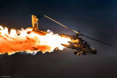IAF AH-64A Apache dispensing flares.