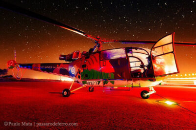 A brightly lit Portuguese Air Force Alouette III.