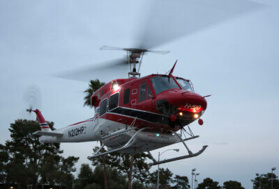 A Bell 212 departs Heli-Expo 2013 in Las Vegas