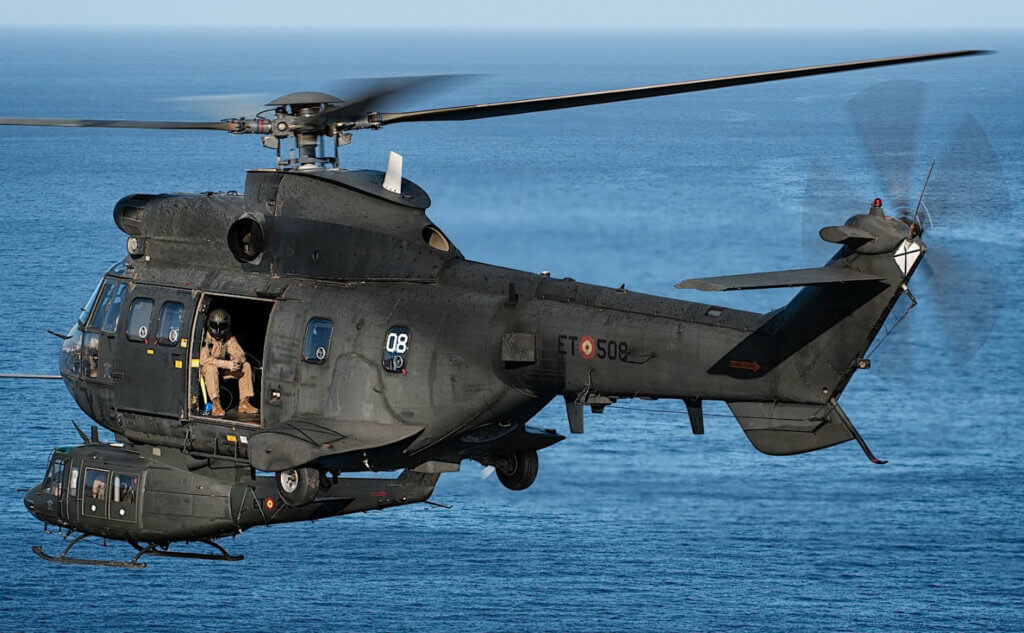Both of the aircraft types operated by BHELMA VI, the AS332 Super Puma and AB212, are pictured here in formation as they approach the Lanzarote airport.