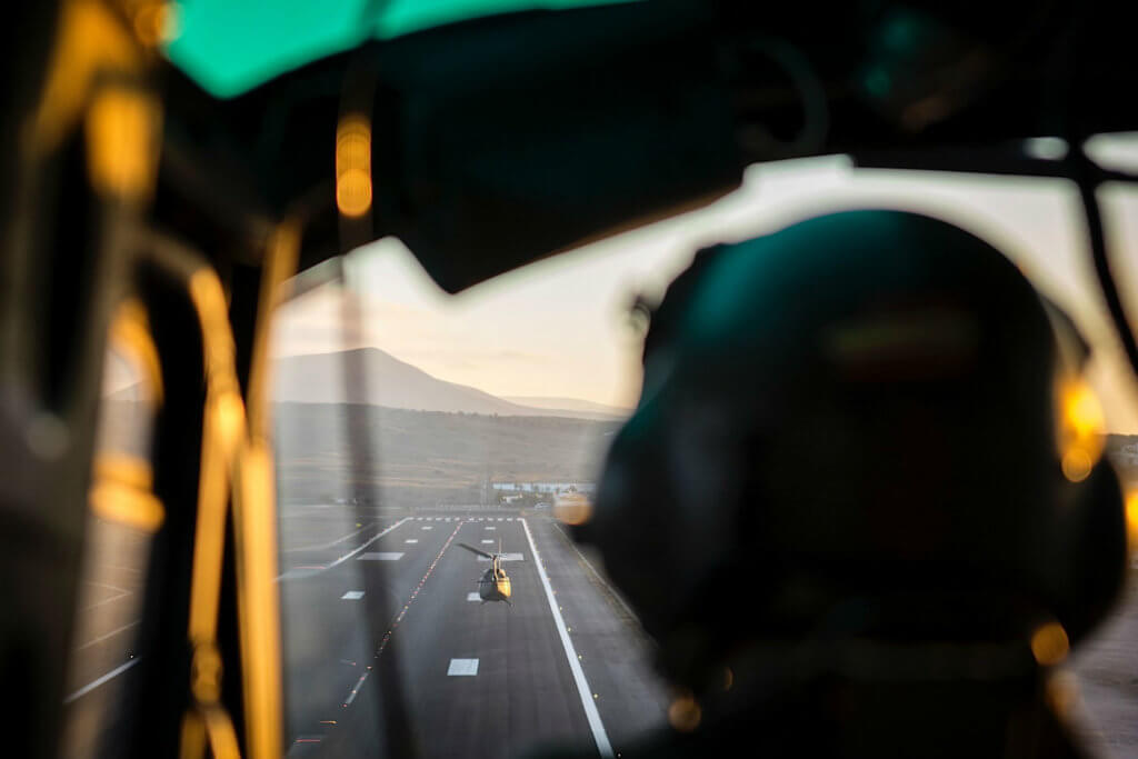 Getting airborne from Lanzarote airport just after sunset for the short flight over to Fuerteventura to pick up troops.