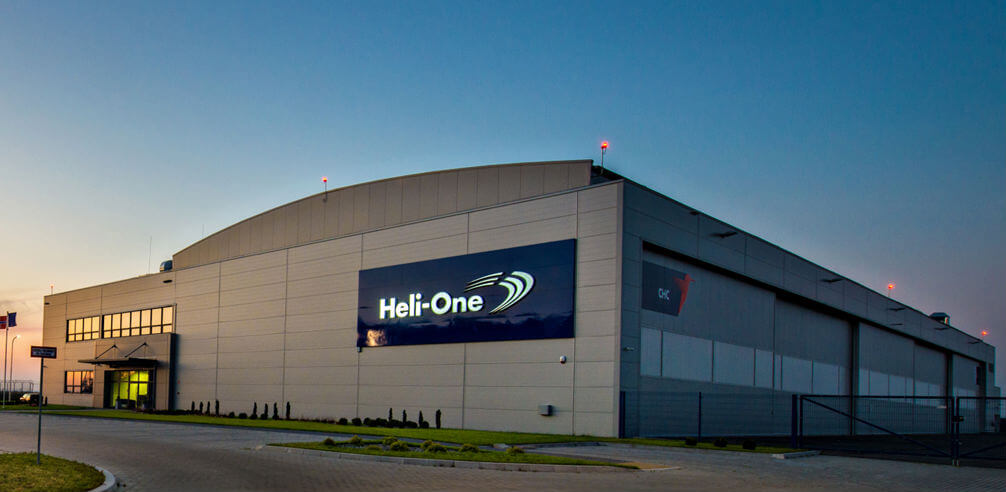 The 65,000-square-foot state-of-the-art facility in Poland has a maintenance hangar capable of accommodating up to six large airframes, a fully equipped avionics workshop, a structure shop with a specialized tail boom repair area, and a dedicated paint bay. Heli-One Photo
