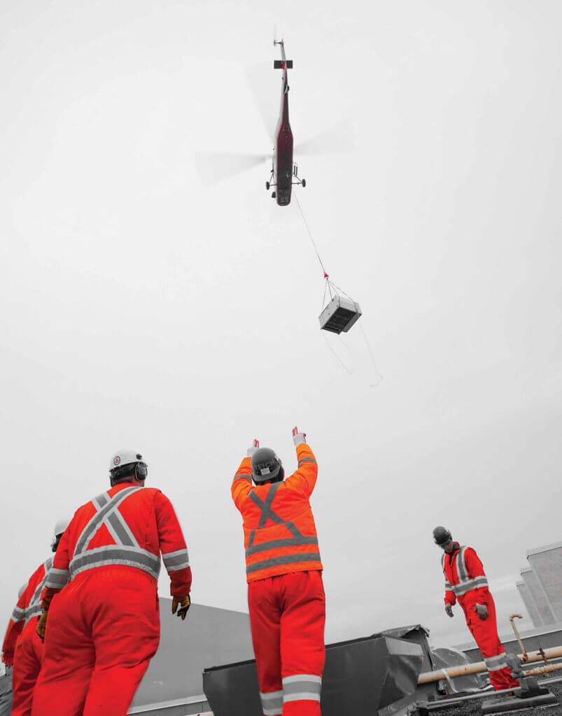 According to Sprint's Ian Bergeron, the owners of Toronto's Yorkdale Shopping Centre have calculated that each parking spot at the mall is worth $15,000 per day of revenue -- so losing dozens of spots for several days to use a ground crane for construction is deemed an unacceptable loss. The speed of a helicopter is therefore seen as hugely valuable.