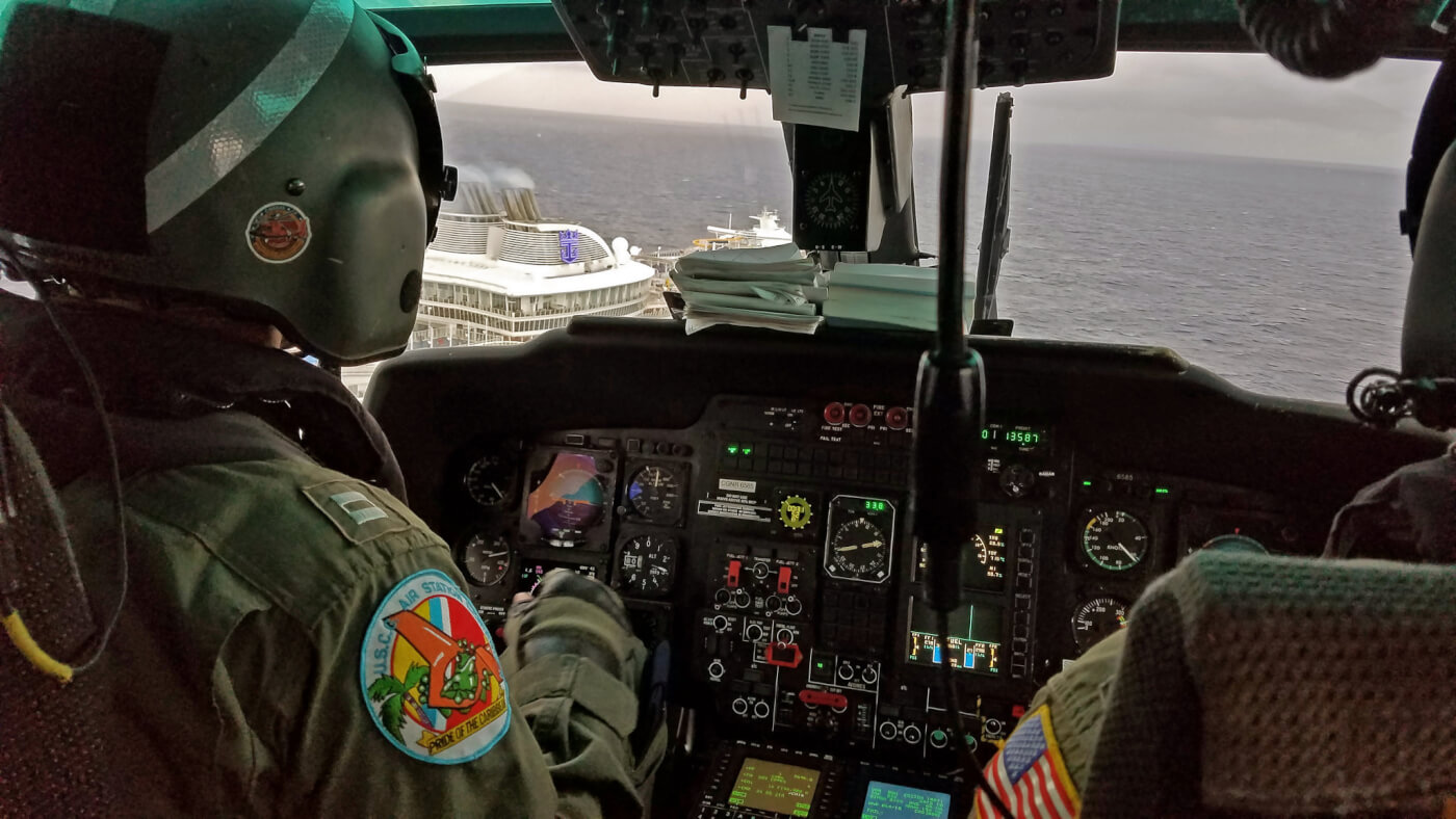 The crew of an MH-65D Dolphin from Air Station Borinquen in Aguadilla, Puerto Rico, conducted a medical evacuation from Harmony of the Seas on Dec. 26. Photos courtesy of Matt Udkow