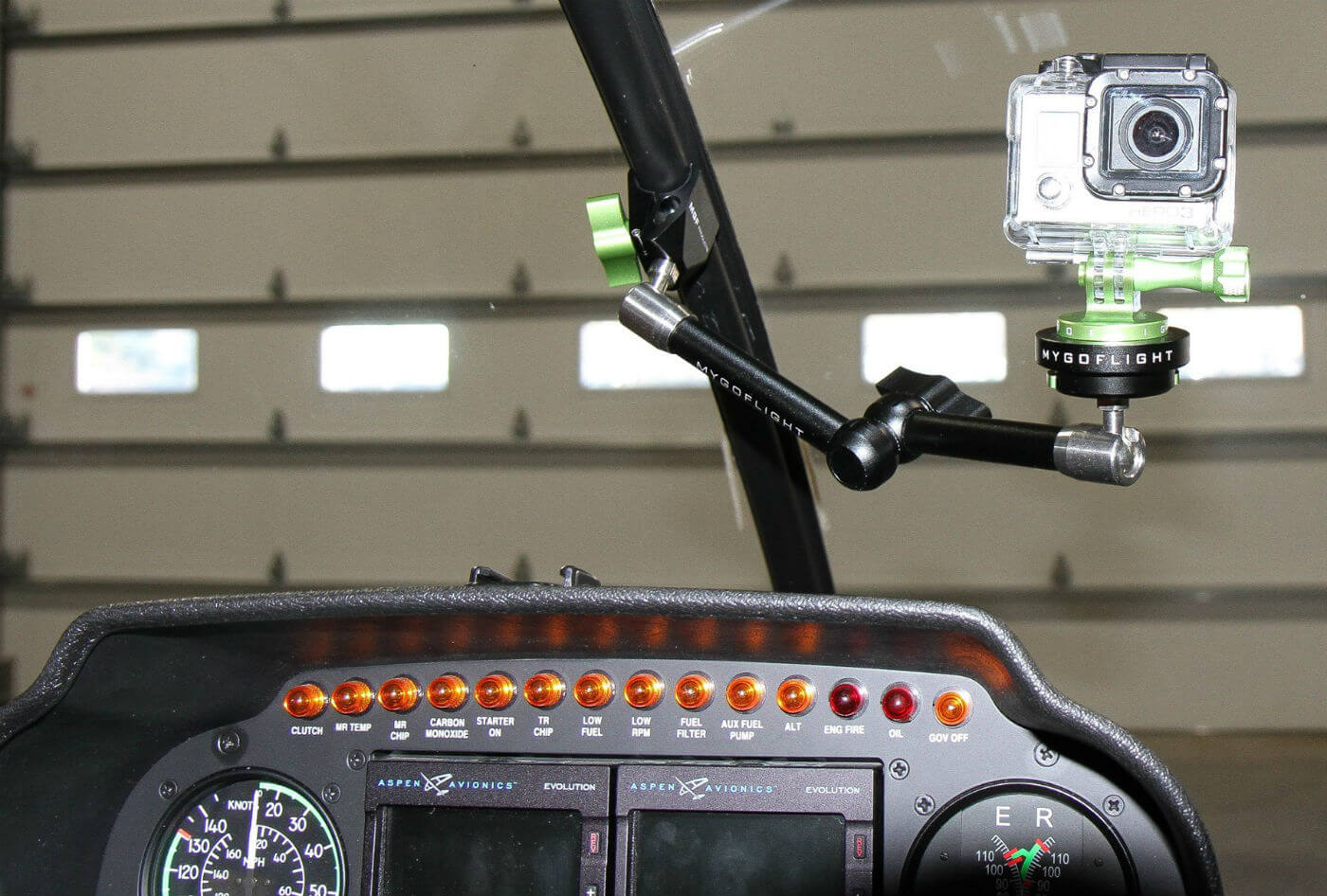 The Robinson Helicopter center spar mount (pictured here) works with the center spar on the windshield of Robinson R22, R44, and R66 helicopters. The mount is formed to the shape of the spar and is then tightened with the knob to secure it in place. MyGoFlight Photo