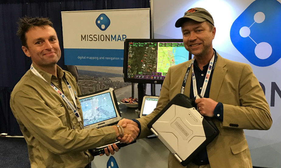 Rhino Air CEO Eric Rudzinski receiving the MISSIONMAP-equipped Panasonic Toughbooks at Heli Expo 2017, in Dallas, Texas. MISSIONMAP Photo