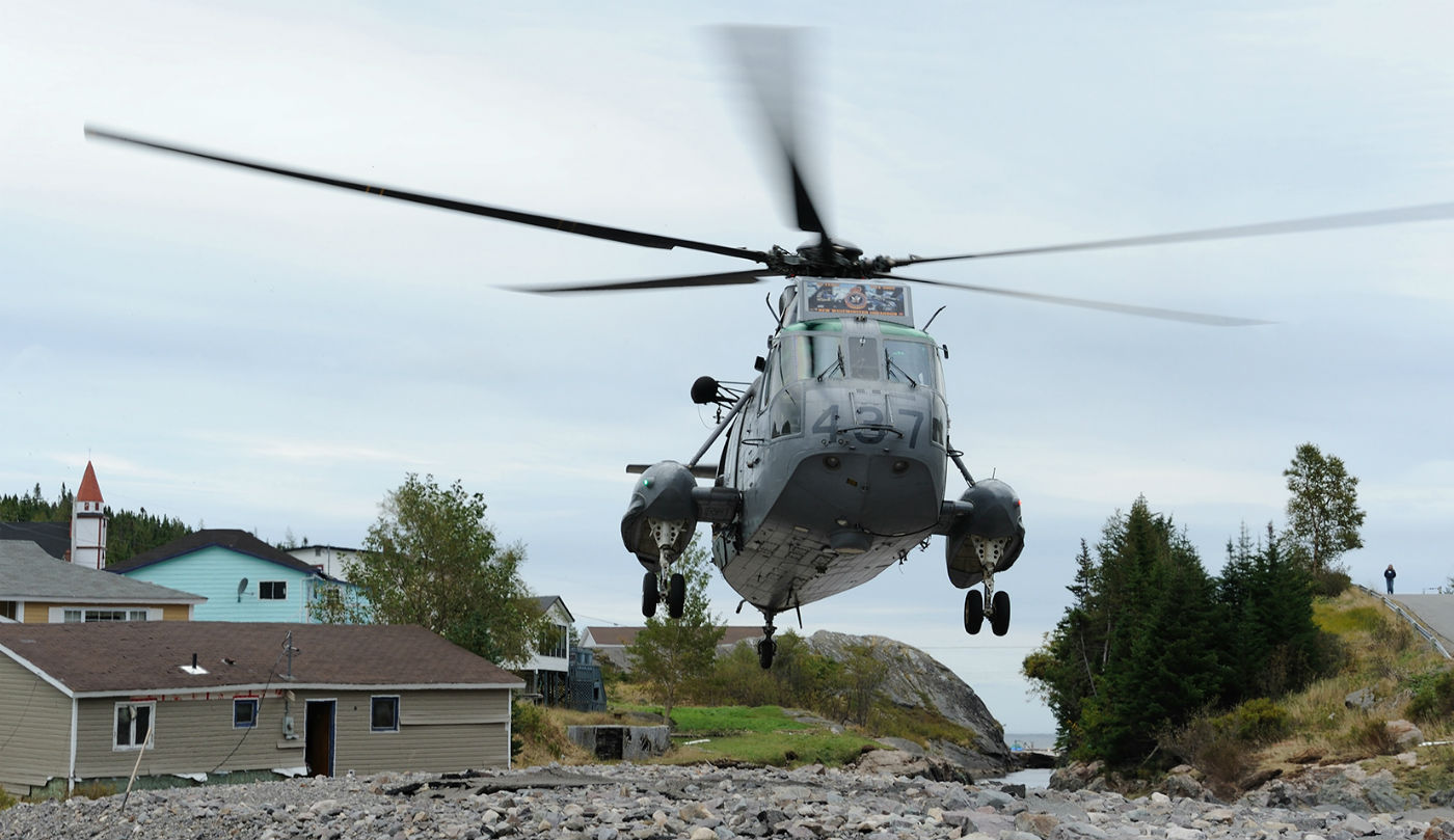 A CH-124 Sea King from 423 Maritime Helicopter Squadron, Shearwater, Nova Scotia, takes off from a river bed in the small community of Trouty, Newfoundland and Labrador. The squadron was supporting relief efforts in the province following Hurricane Igor in September 2010. MCpl Angela Abbey Photo