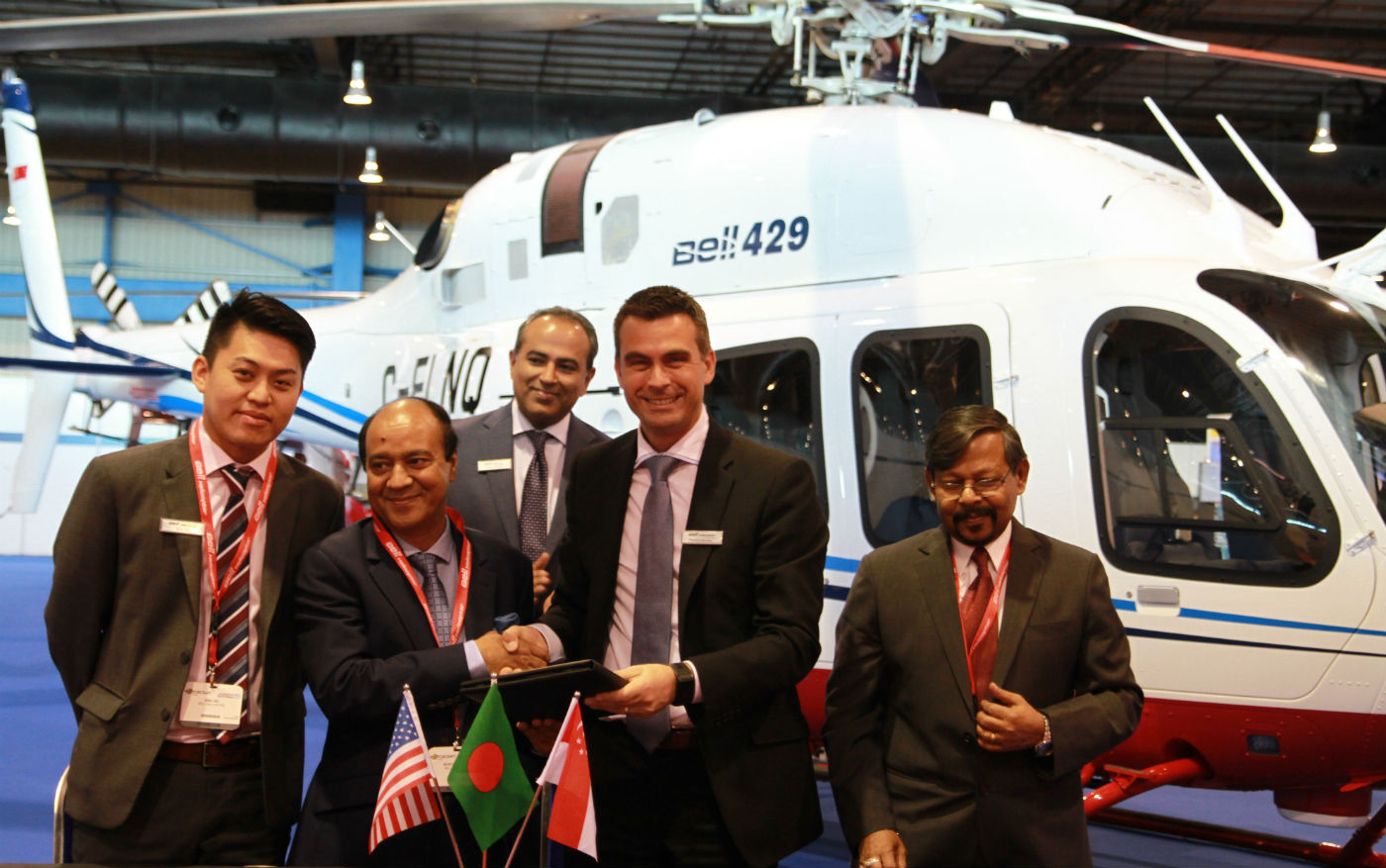 Bell Helicopter and Meghna Aviation celebrate the signing at Rotorcraft Asia. Bell Photo