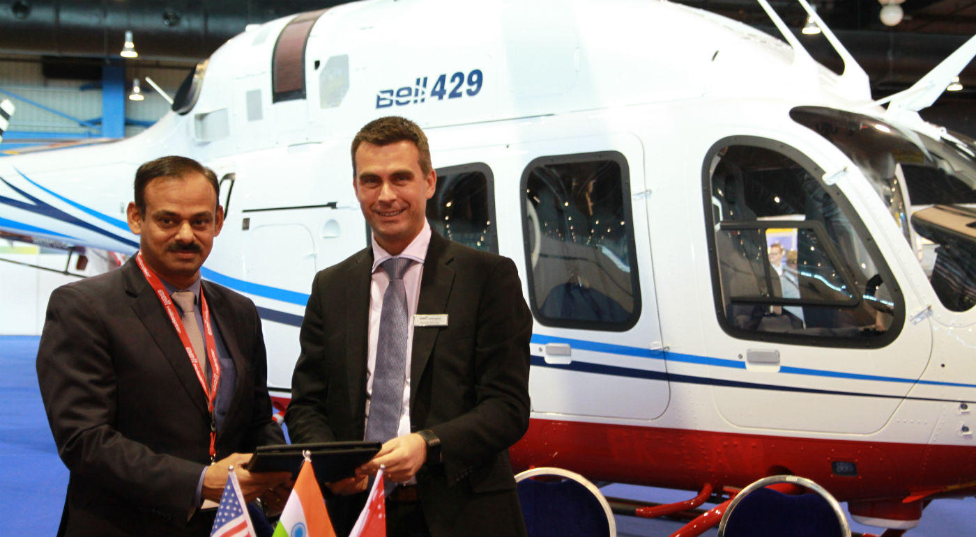 Tata Steel and Bell Helicopter celebrate the recent signing during Rotorcraft Asia. Bell Photo