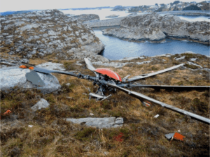 After in-flight breakup, the main rotor was found on a small island. AIBN Photo