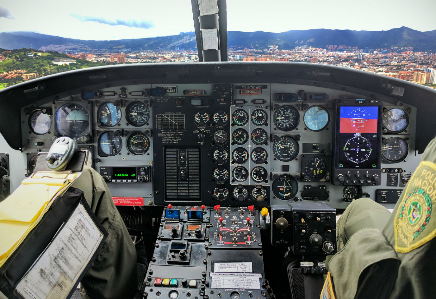 The Astronautics RoadRunner EFI onboard a Bell 212 helicopter as it flew on a demonstration flight with the Colombian National Police. The new RoadRunner EFI offers operators an easy, drop-in replacement for ADI and HSI primary flight instruments in legacy helicopters that enhances safety, reduces maintenance and replacement costs, and lowers installation downtime. Astronautics Photo