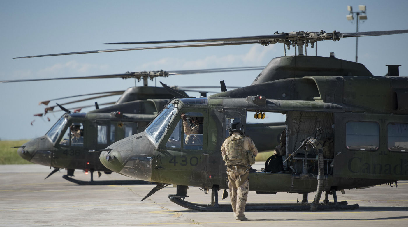Members of Air Task Force - Iraq (ATF-I) from 408 Tactical Helicopter Squadron depart Camp Érable, Iraq, for their first mission onboard a CH-146 Griffon helicopter during Operation Impact on April 25, 2017. DND Photo