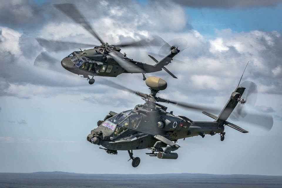 A great shot of a U.S. Army AH-64 Apache and a UH-60 Black Hawk flying in formation over Latvia. Photo submitted by Cristian Schrik/Aimhigh.nl