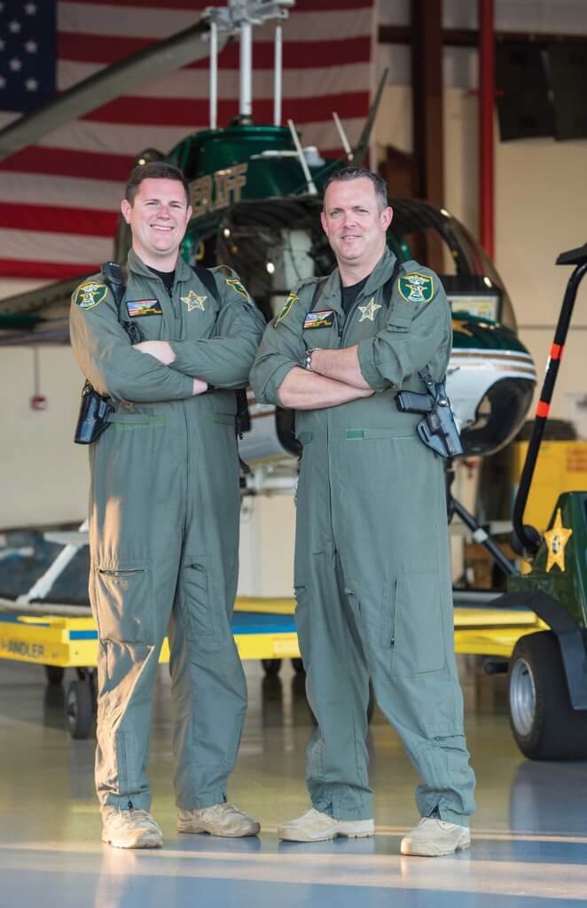TFO Ed Stagmiller (left) and pilot Sean Marston prior to beginning their evening shift.