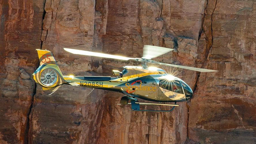 Guests will board a state-of-the-art helicopter where they'll experience majestic, sweeping views of Lake Mead, the Mojave Desert, and the Grand Canyon with a landing option at a private bluff for a champagne toast. Sundance Photo
