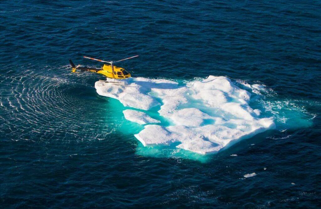A Panorama Helicopters AS350 B2 lands on an iceberg in the Arctic. Photo submitted by Instagram user @snorak88 using hashtag #verticalmag