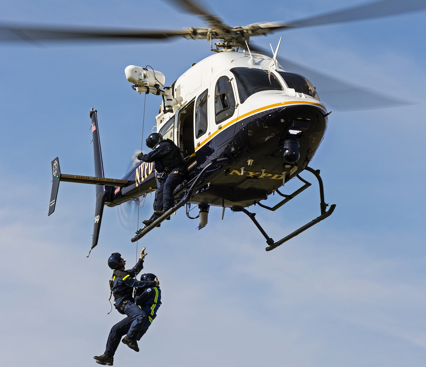 A Bell 429, operated by the NYPD, performs a hoist training mission. Able Aerospace Services now offers repair and overhaul services for the type. Able Aerospace Services Photo