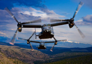 Two V-22 Ospreys in flight