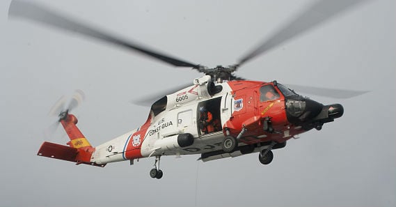 A Coast Guard Air Station Kodiak MH-60 Jayhawk helicopter hoisted a man from the Snowy vessel off the coast of Alaska, as he suffered from appendicitis. Wikimedia Commons Photo