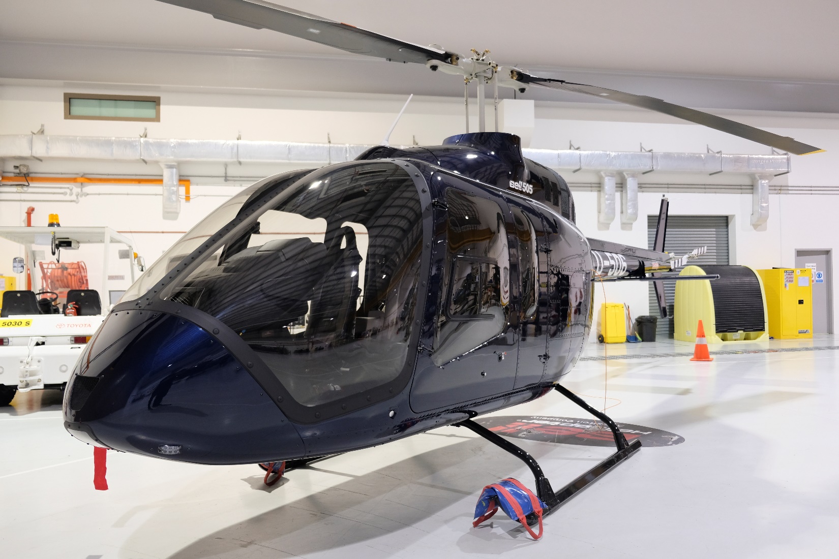The 505s cabin can be configured to carry up to four passengers or configured for internal cargo missions by quickly removing disconnect rear cabin seats and/or copilot seat. Bell Helicopter Photo