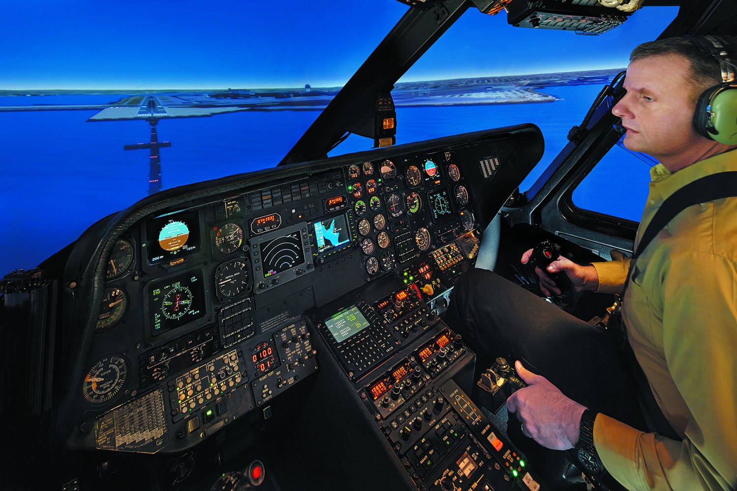 Students practice with instruction inside a FlightSafety Sikorsky S-76B Flight Simulator. FlightSafety Photo