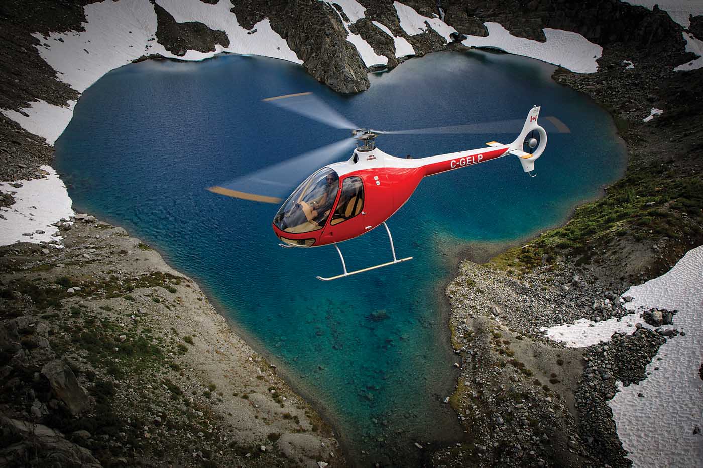 In love with the Cabri… A BC Helicopters Guimbal Cabri G2 is framed by a heart-shaped lake during a photo shoot just north of Abbotsford, British Columbia. Heath Moffatt Photo
