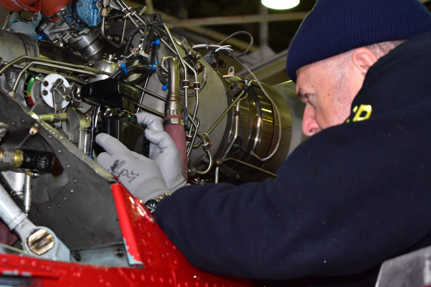 Harald Reichel of the NTSB’s Office of Aviation Safety examines the engine of a Liberty Helicopters AS30 B2 that crashed in the East River on March 11, 2018. Chris O’Neil/NTSB Photo