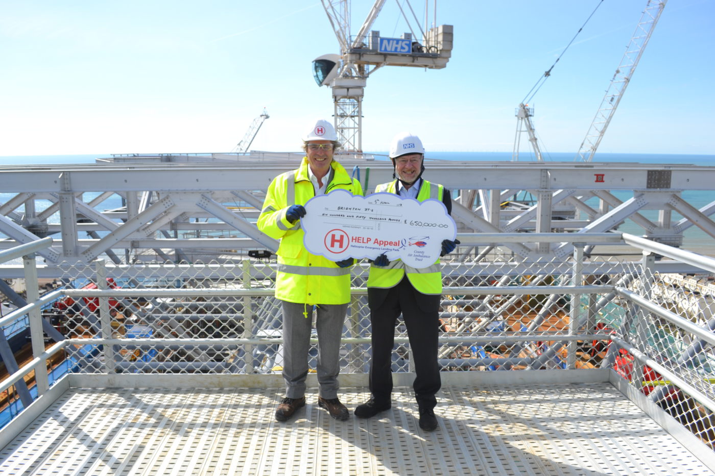 From left: Robert Bertram, HELP Appeal’s chief executive officer presenting a cheque to Duane Passman, director of the RSCH Redevelopment. HELP Appeal Photo