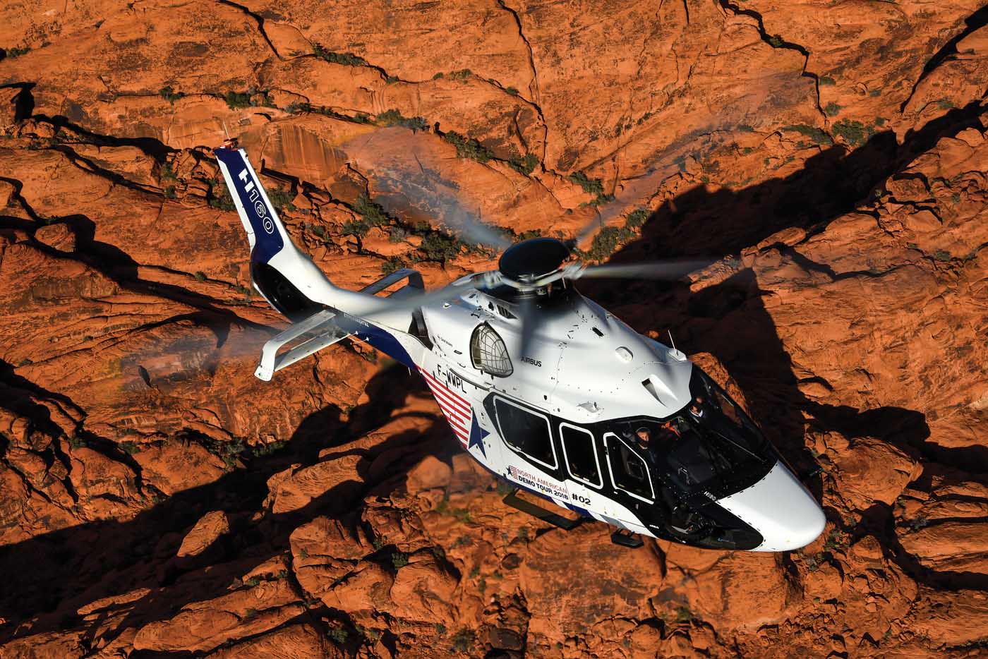 The second Airbus H160 prototypes flies near the Red Rock Canyon area west of Las Vegas in late February, prior to launching on its North American demo tour. Mike Reyno Photo