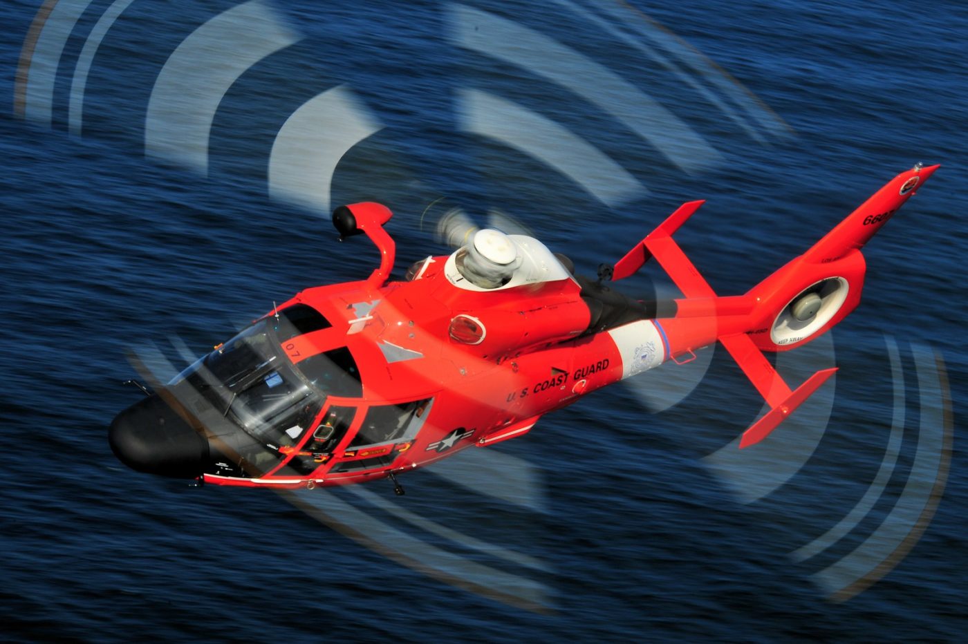 By the end of next year, the U.S. Coast Guard will start upgrading its MH-65 Dolphin helicopters with new avionics, yielding MH-65E models with enhanced capabilities and extended service life expectancies. Skip Robinson Photo