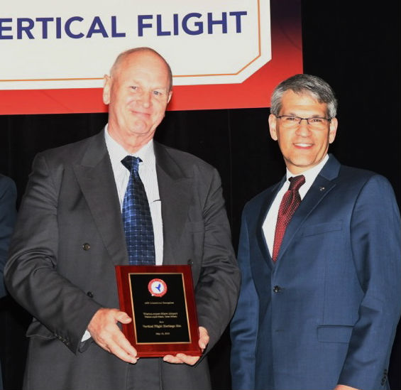 The award was presented by VFS executive director Michael Hirschberg (right), to museum volunteer Alan Norris (left). Helicopter Museum Photo