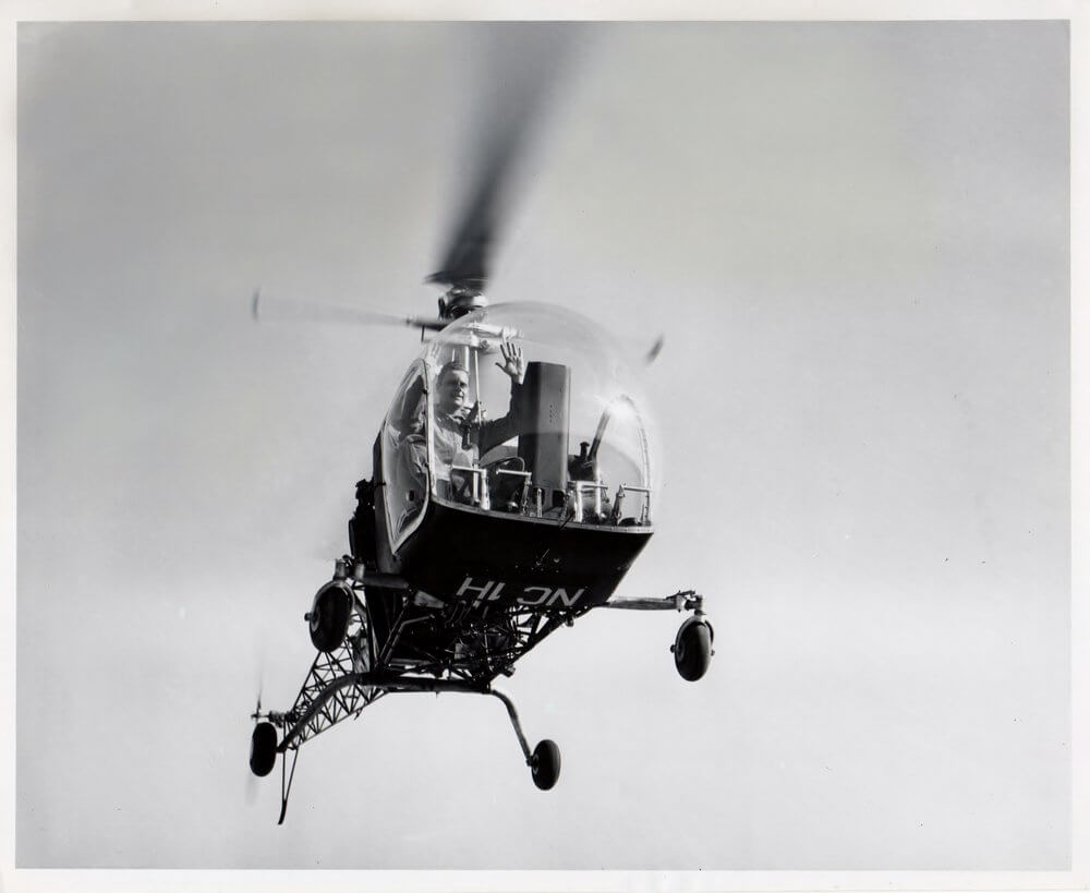 Floyd Carlson, chief test pilot, Bell Aircraft, hovers the world's first civil-certified helicopter, NC1H, Serial Number One. Bell Photo