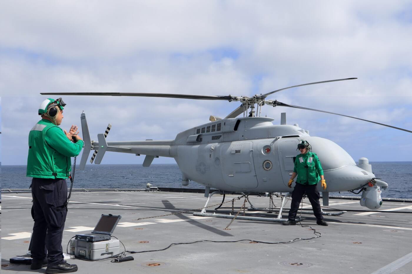 Aviation machinist’s mate second class Salvatore Green (left) and aviation electronics technician third Class Jake Price, both assigned to Air Test and Evaluation Squadron (VX) 1, prepare the MC-8C Fire Scout unmanned helicopter for launch aboard the littoral combat ship USS Coronado (LCS 4). Jalen Robinson Photo