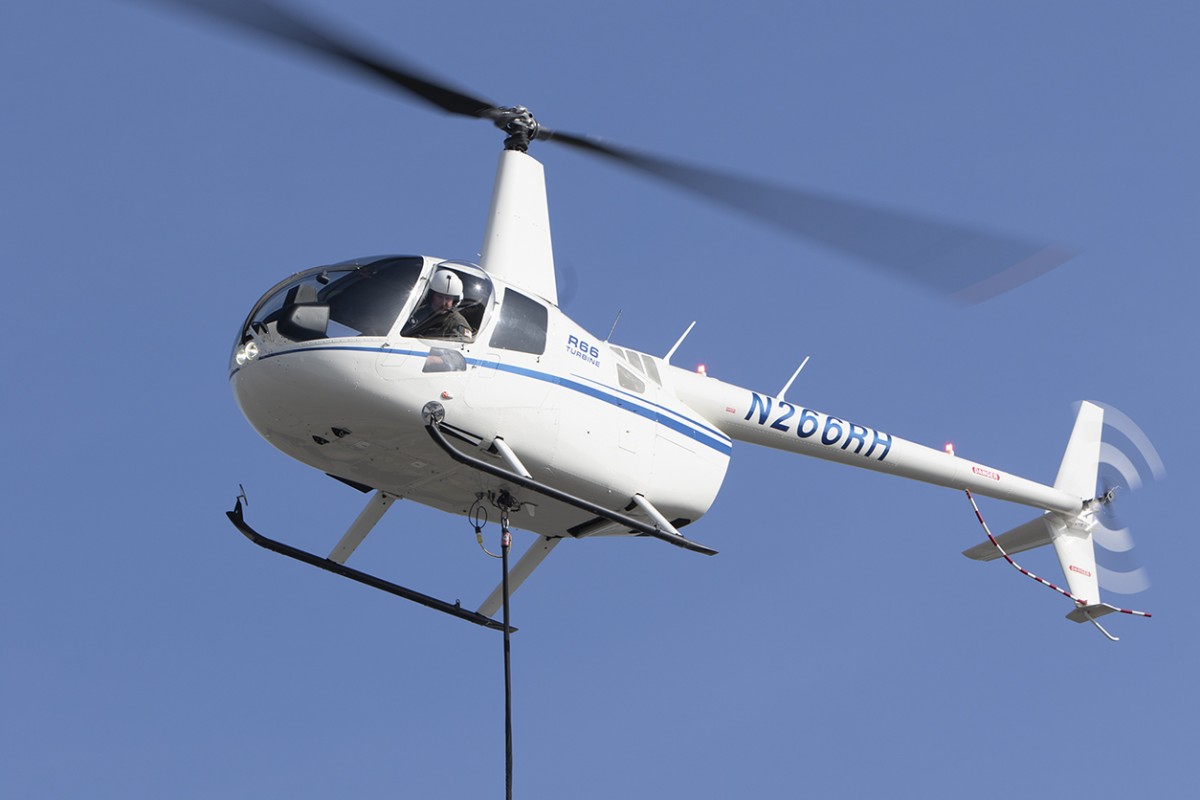 The cargo hook increases the R66’s maximum gross weight from 2,700 lb to 2,900 lb. Robinson Photo