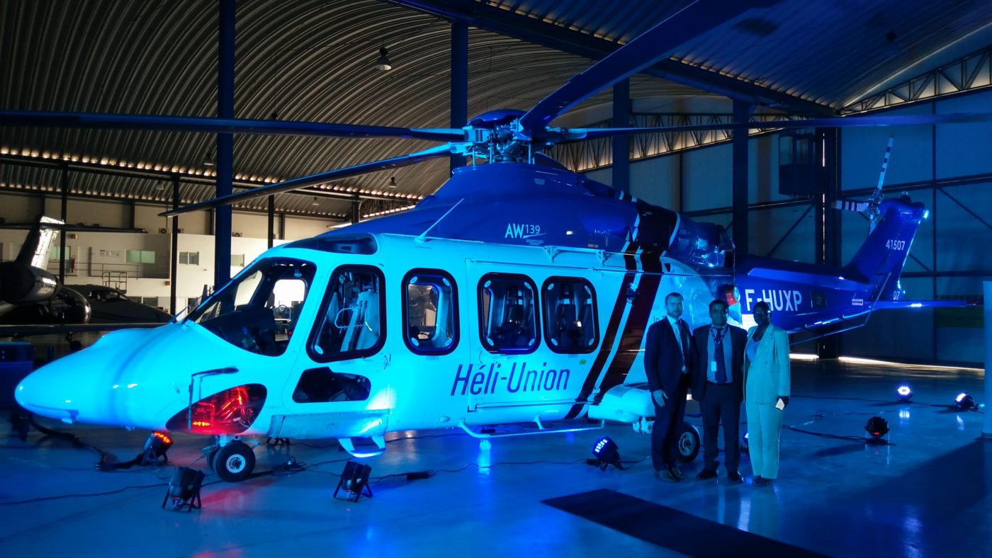 From left: Jonathan Cosson, deputy managing director of Heli-Union; Nuno Pereira, chairman of Bestfly; and Alcinda Pereira, CEO of Bestfly stand in front of a Heli-Union Leonardo AW139 in celebration of the partnership. Heli-Union Photo