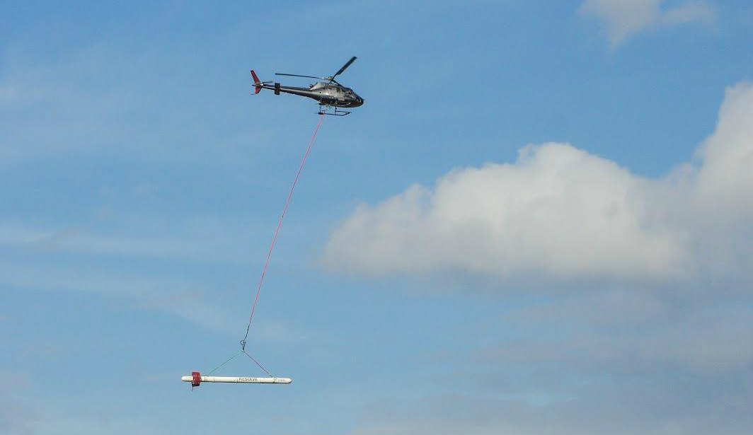 The CGG RESOLVE helicopter system in Greenwood, Mississippi. The USGS is working with CGG and other partners to gather geophysical information related to the Mississippi Alluvial Plain. Burke Minsley Photo