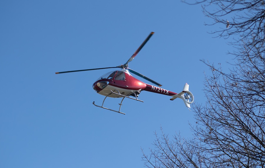 Charlie Weigandt, the programs director and chief helicopter pilot, lowers GOV 1 onto APSU’s campus. APSU Photo