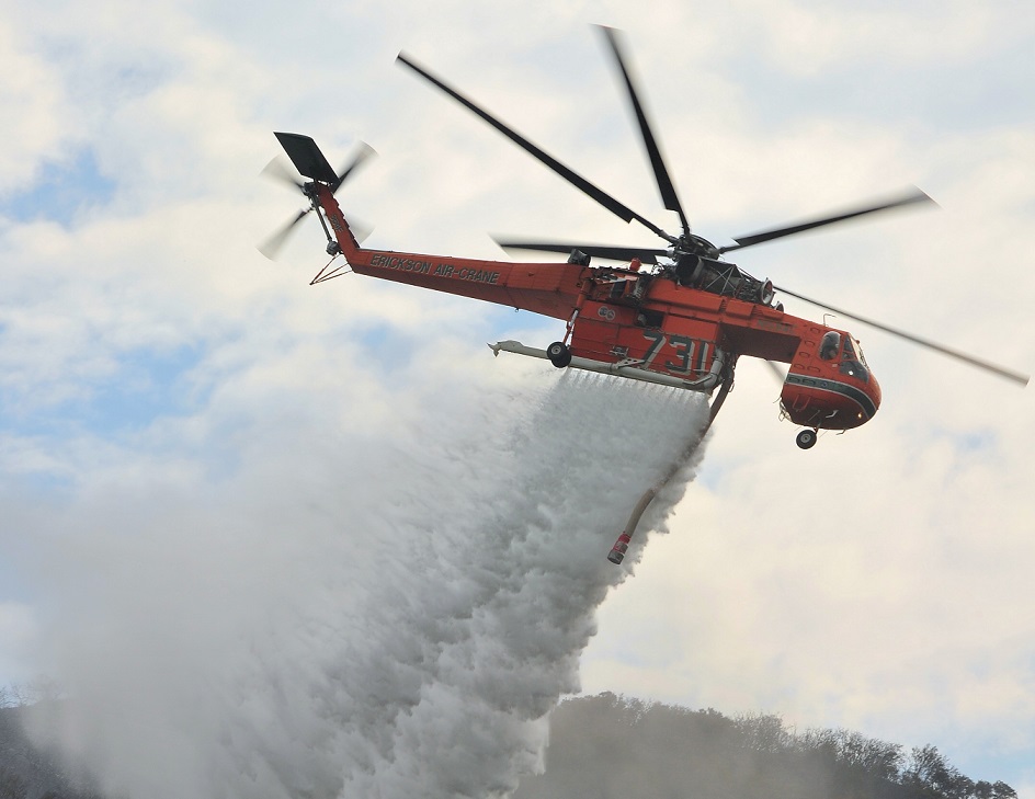 The Erickson Aircrane crashed while refilling its water tank from a dam while working on the Thomson Complex Catchment fires near Jericho, Australia. Skip Robinson Photo