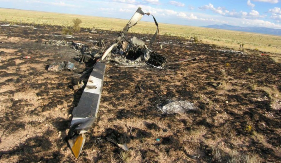 Helicopter wreckage with fire damage